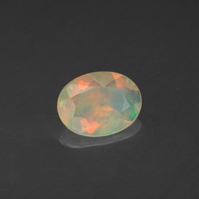 Ópalo multicolor natural de 0,71 ct, transparente, transparente / translúcido