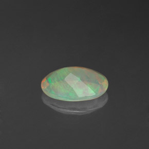 Ópalo multicolor natural de 0,71 ct, transparente, transparente / translúcido