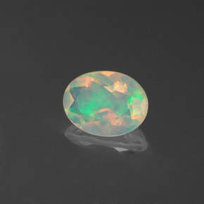 Ópalo multicolor natural de 0,71 ct, transparente, transparente / translúcido