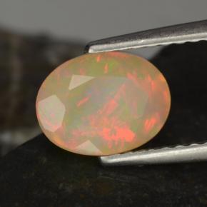 Ópalo multicolor natural de 0,97 ct, corte óvalo, translúcido