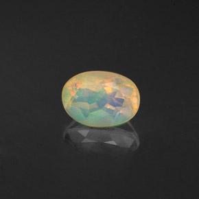 Ópalo multicolor natural de 0,59 ct, transparente, transparente / translúcido