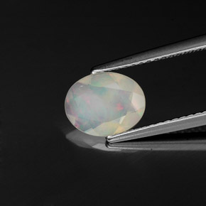 Ópalo multicolor natural de 0,78 ct, transparente, transparente / translúcido