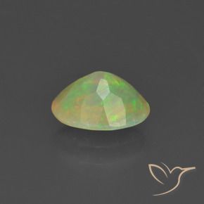 Ópalo Multicolor natural de 0.73 ct, Ovalada, Translúcido