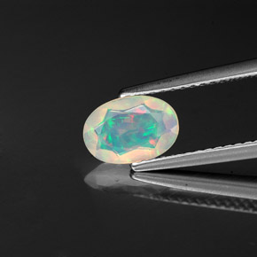 Ópalo multicolor natural de 0,57 ct, transparente, transparente / translúcido
