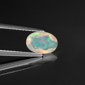 Ópalo multicolor natural de 0,57 ct, transparente, transparente / translúcido