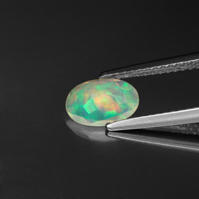 Ópalo multicolor natural de 0,57 ct, transparente, transparente / translúcido