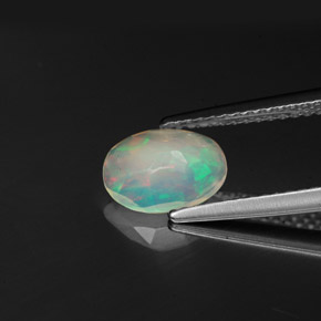 Ópalo multicolor natural de 0,58 ct, transparente, transparente / translúcido