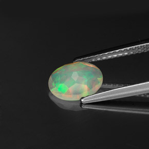 Ópalo multicolor natural de 0,73 ct, transparente, transparente / translúcido