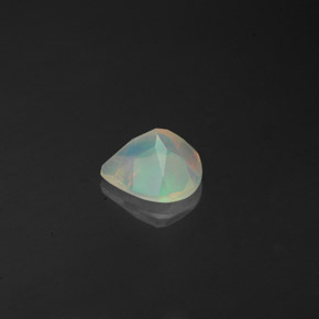 Ópalo multicolor natural de 0,61 ct, transparente, transparente / translúcido