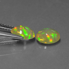 Gemas de ópalo multicolor natural de  ct, corte óvalo, transparente