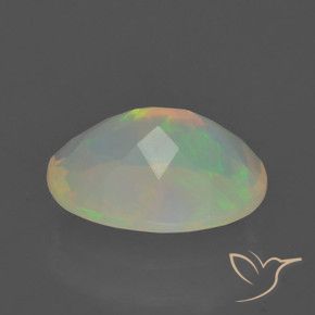 Ópalo Multicolor natural de 1.40 ct, Ovalada, Transparente