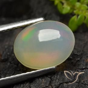 Ópalo Multicolor natural de 1.22 ct, Ovalada, Transparente