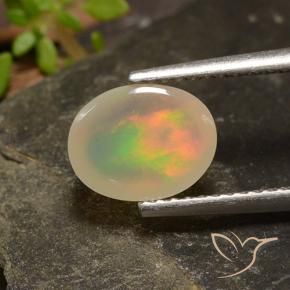 Ópalo Multicolor natural de 1.36 ct, Ovalada, Transparente