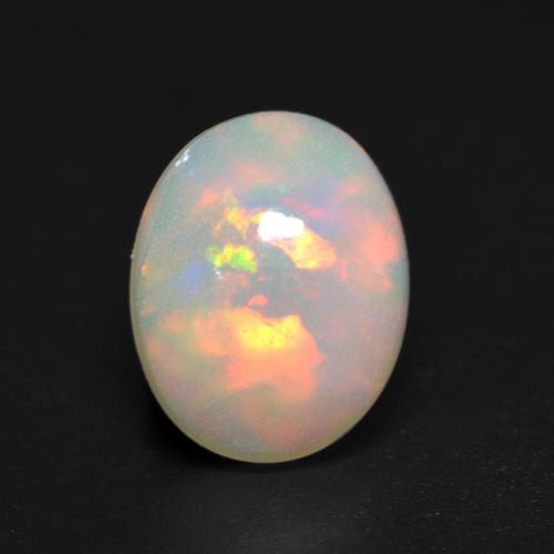 Ópalo multicolor natural de 1,14 ct, corte óvalo, transparente