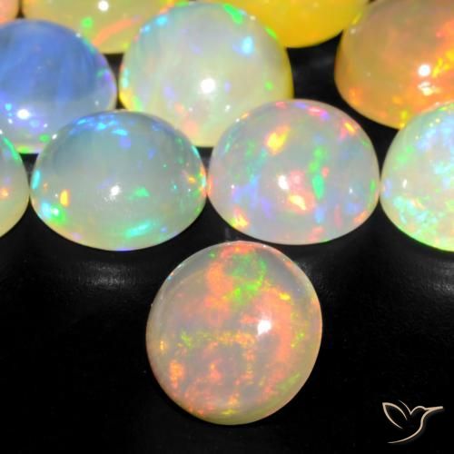 Ópalo Multicolor natural de 0.86 ct, Redondo, Transparente