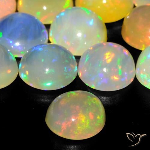 Ópalo Multicolor natural de 0.86 ct, Redondo, Transparente