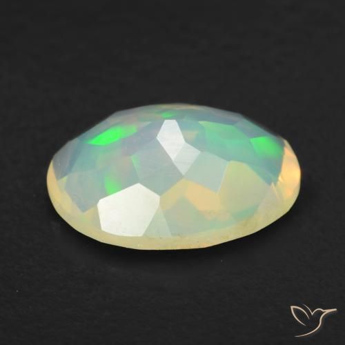 Ópalo Multicolor natural de 0.73 ct, Ovalada, Transparente