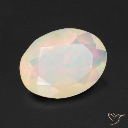 Ópalo Multicolor natural de 0.96 ct, Ovalada, Transparente