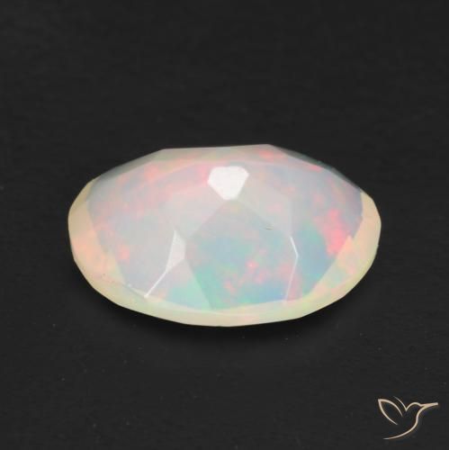 Ópalo Multicolor natural de 0.96 ct, Ovalada, Transparente