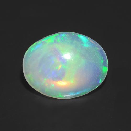 Ópalo multicolor natural de 0,79 ct, corte óvalo, transparente