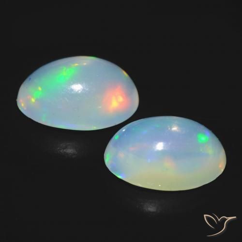 Gemas de Ópalo Blanco azulado natural de 0.89 ct, Ovalada, Transparente