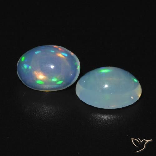 Gemas de Ópalo Blanco azulado natural de 0.89 ct, Ovalada, Transparente