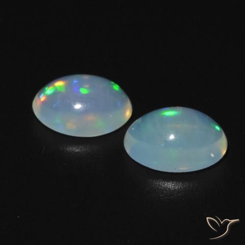Gemas de Ópalo Blanco azulado natural de 0.89 ct, Ovalada, Transparente