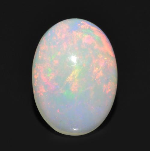 Ópalo Multicolor natural de 0.83 ct, Corte Óvalo, Transparente