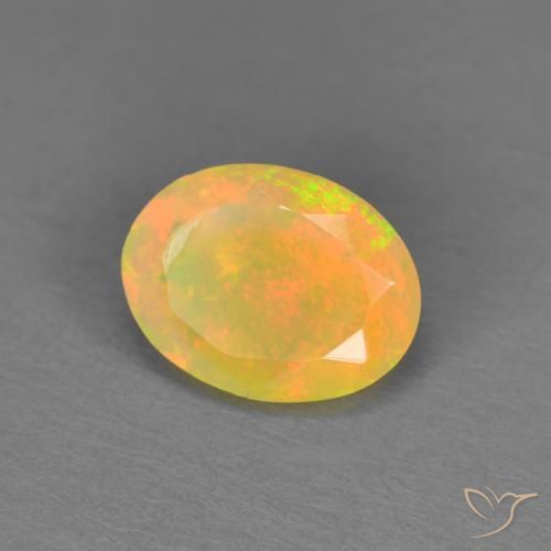 Ópalo Multicolor natural de 0.84 ct, Ovalada, Translúcido