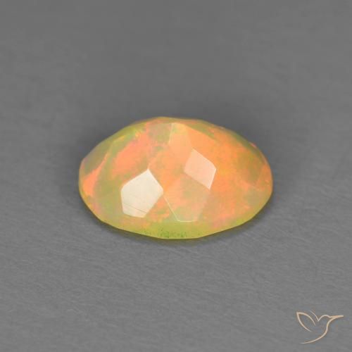 Ópalo Multicolor natural de 0.84 ct, Ovalada, Translúcido
