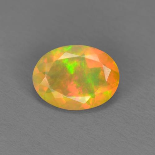 Ópalo multicolor natural de 0,74 ct, corte óvalo, translúcido