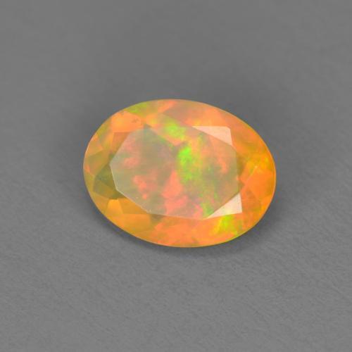 Ópalo multicolor natural de 0,74 ct, corte óvalo, translúcido
