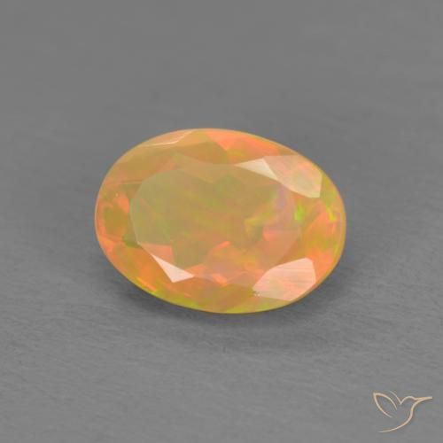 Ópalo Multicolor natural de 0.74 ct, Ovalada, Translúcido