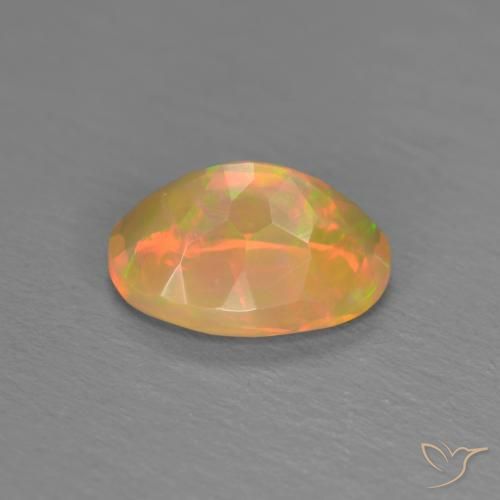 Ópalo Multicolor natural de 0.74 ct, Ovalada, Translúcido