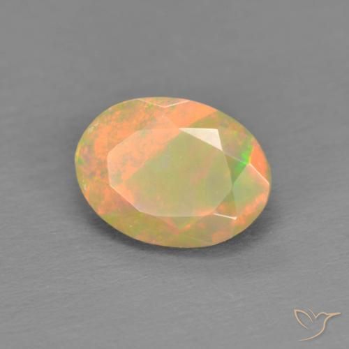 Ópalo Multicolor natural de 0.82 ct, Ovalada, Translúcido