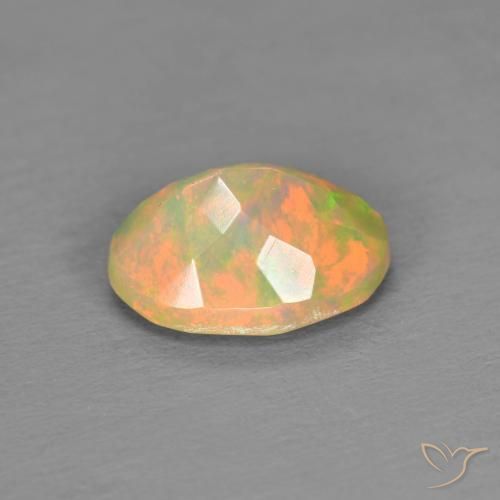 Ópalo Multicolor natural de 0.82 ct, Ovalada, Translúcido