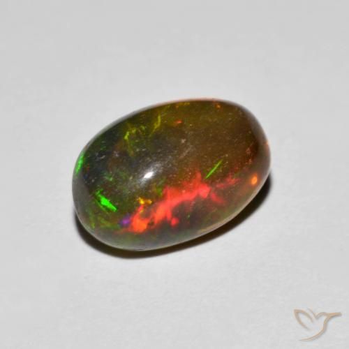 Ópalo Multicolor natural de 1.41 ct, Ovalada, Transparente