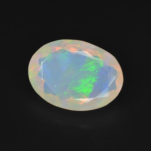 Ópalo Blanco multicolor natural de 3.11 ct, Ovalada, Transparente