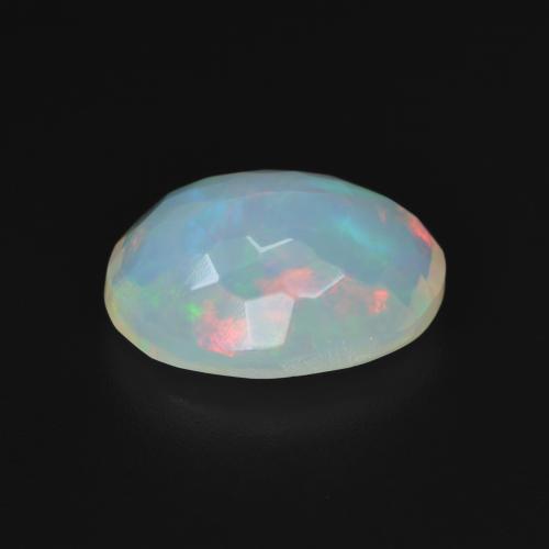 Ópalo Blanco multicolor natural de 3.11 ct, Ovalada, Transparente