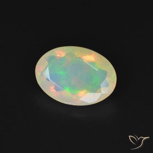 Ópalo Multicolor natural de 0.95 ct, Ovalada, Transparente