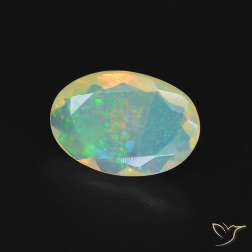 Ópalo Multicolor natural de 1.23 ct, Ovalada, Transparente
