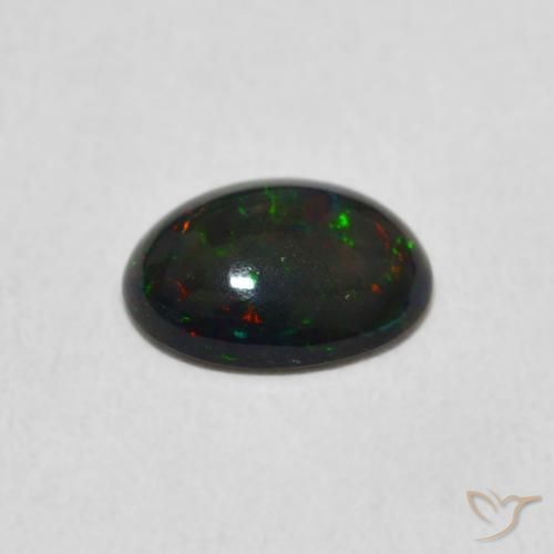 Ópalo Multicolor natural de 0.68 ct, Ovalada, Opaco