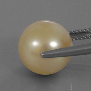 Perla amarillo natural de 11,50 ct, esfera / bola, opaco
