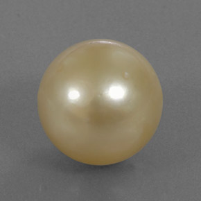 Perla amarillo natural de 13,12 ct, esfera / bola, opaco