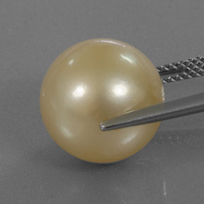 Perla amarillo natural de 13,12 ct, esfera / bola, opaco
