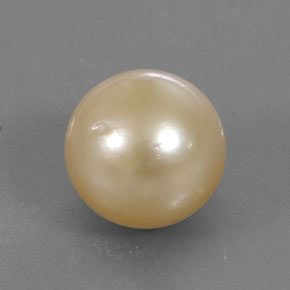 Perla amarillo natural de 12,37 ct, esfera / bola, opaco