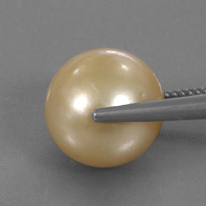 Perla amarillo natural de 15,02 ct, esfera / bola, opaco