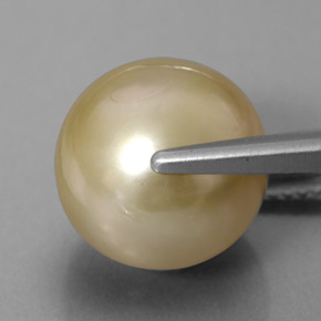 Perla amarillo natural de 11,75 ct, esfera / bola, opaco