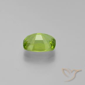 Peridoto Verde medio natural de 2.49 ct, Forma Cojín, VS