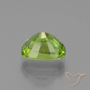Peridoto Verde medio natural de 2.40 ct, Forma Cojín, VS